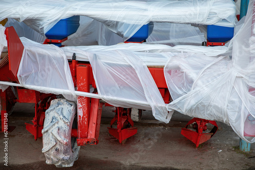 Storage and Conservation of agro harvesting equipment for the winter. Machinery for agriculture.