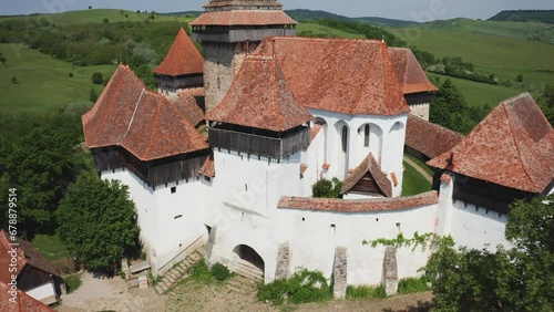 Fortified church and fortress of Viscri in Transylvania, Romania, Europe, Aerial view