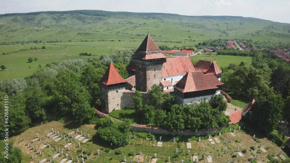 Fortified church and fortress of Viscri in Transylvania, Romania, Europe, Aerial view Fortified church and fortress of Viscri in Transylvania, Romania, Europe, Aerial view