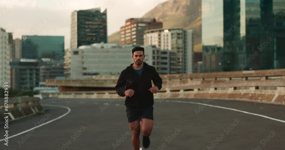 Fitness, running and man in a city street for workout, training or performance, energy or resilience. Marathon, challenge and male runner in a road with speed, wellness or cardio sports exercise Fitness, running and man in a city street for workout, training or performance, energy or resilience. Marathon, challenge and male runner in a road with speed, wellness or cardio sports exercise