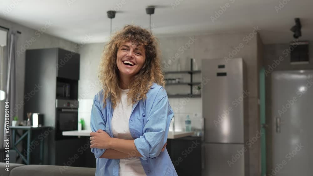 Portrait of one adult caucasian woman at home happy smile curly hair Portrait of one adult caucasian woman at home happy smile curly hair