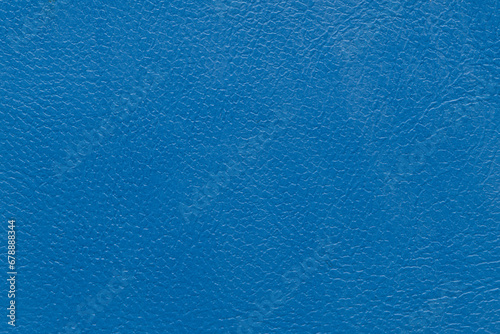 Closeup detail on blue leather texture background photo