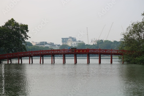 Huc bridge across the Hoan Kiem lake leading to Ngoc Son temple in Hanoi, Vietnam photo