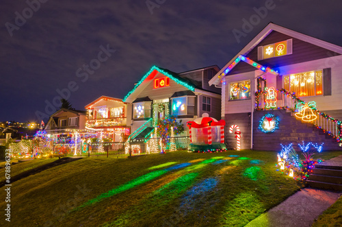 Vancouver, Canada, December 26, 2022: House Decorated and Lighted for Christmas at Night. © karamysh