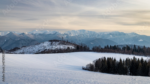 Winter snowy landscape with mountains in background. The Mala Fatra national park in Slovakia, Europe.