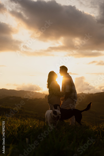 silhouette of couple kissing at the sunset
