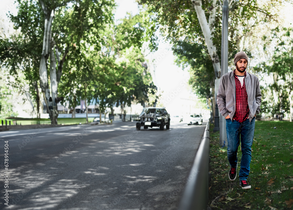 Casual urban stroll, young man in street fashion, Madrid's autumn ambiance. Casual urban stroll, young man in street fashion, Madrid's autumn ambiance.