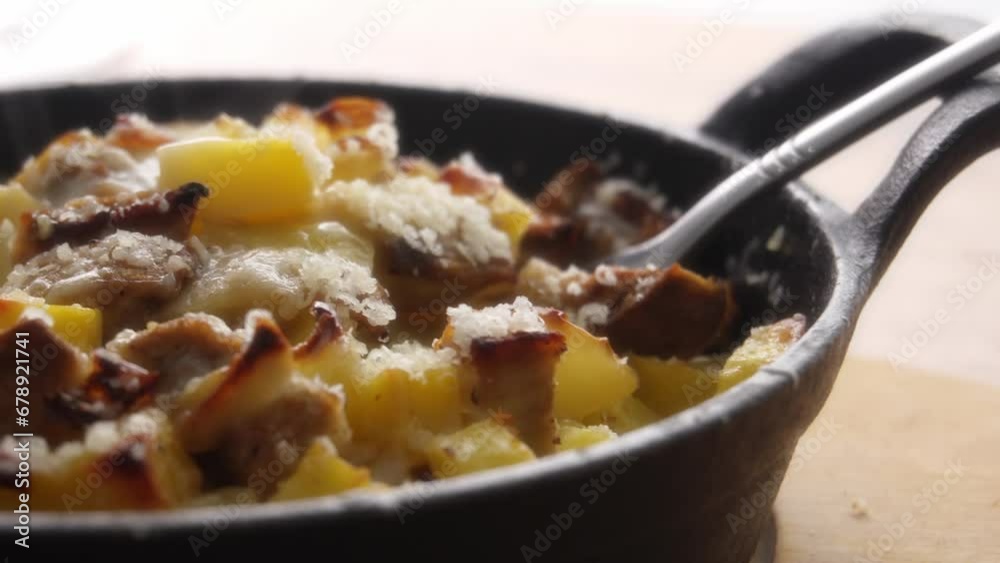 Hot Cheesy Potato and Meat Cast Iron Skillet Meal.