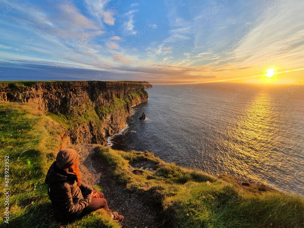 Fototapeta premium The Cliffs of Moher are sea cliffs located at the southwestern edge of the Burren region in County Clare, Ireland. They run for about 14 kilometres