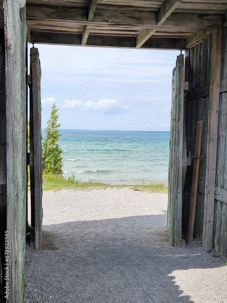 Fototapeta premium View of the lake from the old open doors of Fort Michilimackinac in Mackinaw, Michigan.