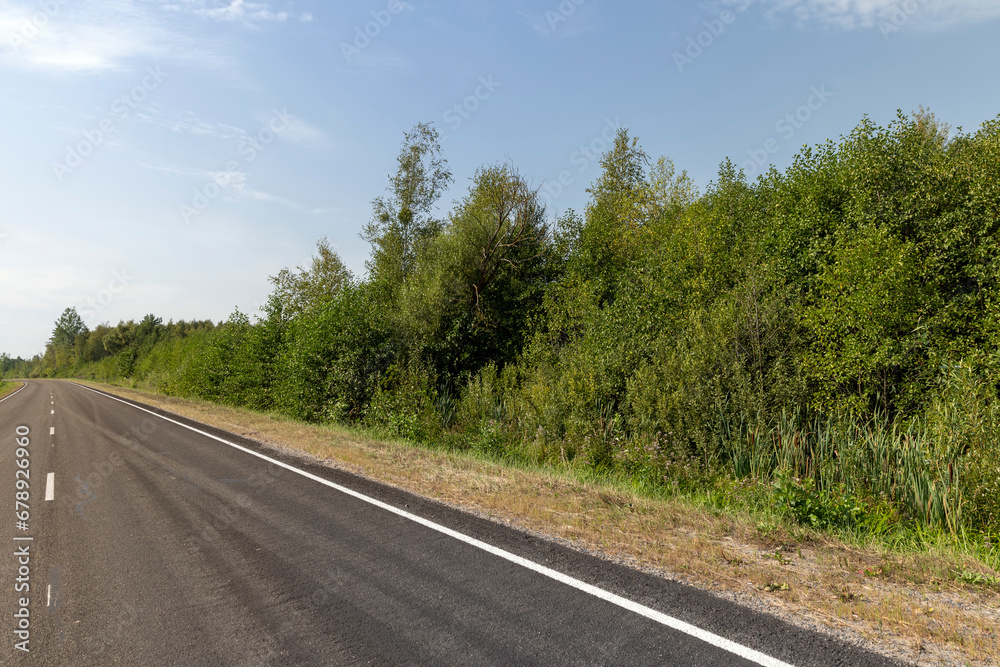 Narrow paved road for cars