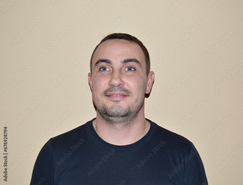 Obraz premium portrait of a young handsome man with blue eyes, light stubble and various emotions. young people leading a healthy lifestyle, open to communication, positive and friendly