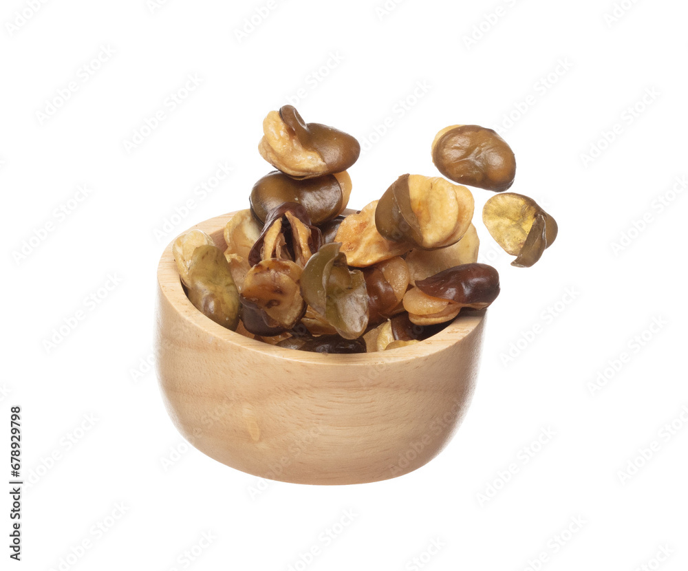 Salt Broad Beans flying explosion, broad bean fall down pour from wooden bowl. Tropical Salty roasted broad bean splash throwing in Air. White background Isolated high speed shutter, freeze action Salt Broad Beans flying explosion, broad bean fall down pour from wooden bowl. Tropical Salty roasted broad bean splash throwing in Air. White background Isolated high speed shutter, freeze action
