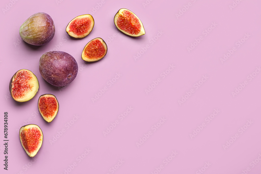 Fototapeta premium Fresh ripe figs on purple background