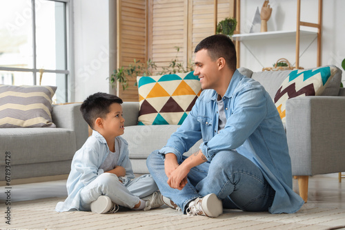 Happy father and son bondin...