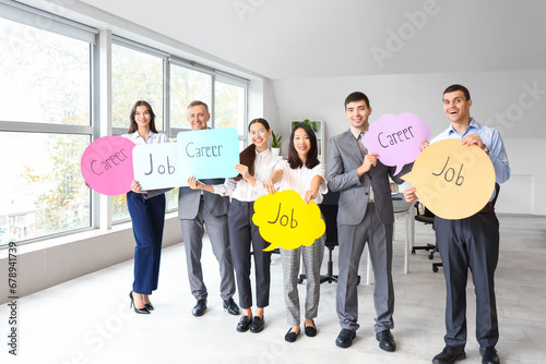 Business colleagues holding...