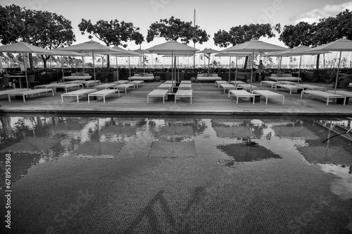 Swimming Pool and Umbrellas in Black and White.