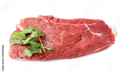 Piece of raw beef meat with parsley isolated on white