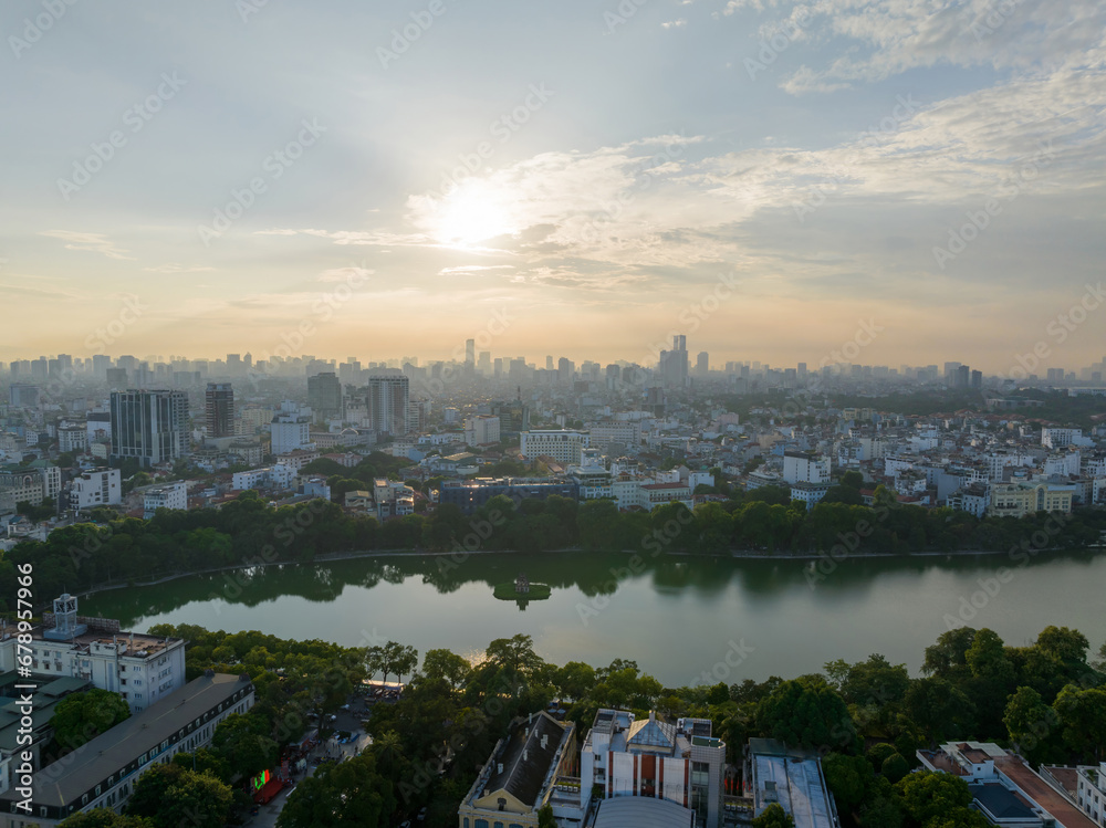 Naklejka premium Aerial skyline view of Hoan Kiem lake ( Sword, Ho Guom lake), in center of Hanoi, Vietnam