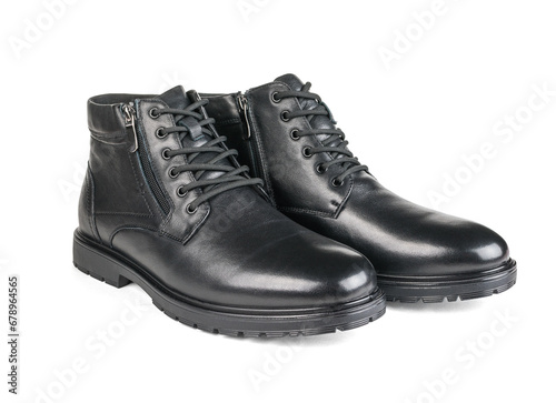 A pair of men's brutal leather boots isolated on a white background.