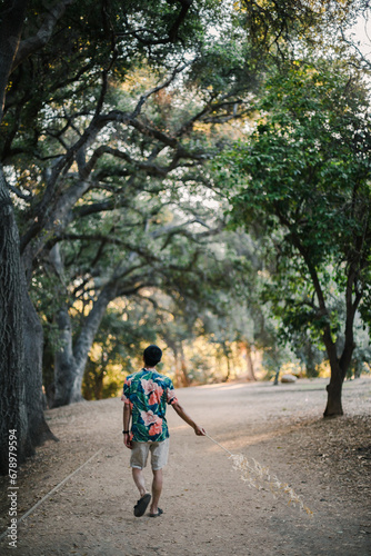 Wallpaper Mural man walking in nature  Torontodigital.ca