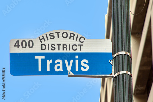 street sign travis in downtown Houston, Texas photo