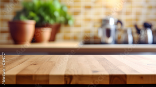 An empty brown wooden countertop and a blurred background of the interior of a modern kitchen, a demonstration of the installation of the product.