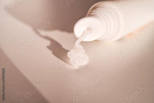 Hygienic moisturizing lip balm in a tube on a white background. photo
