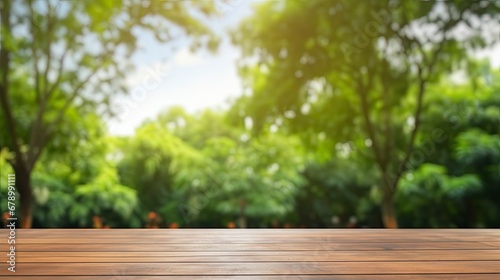 Wooden Table Top with Blurred Green Park Garden as Background.