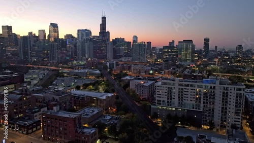 Drone hyperlapse over the streets of River West and Fulton River, dusk in Chicago photo