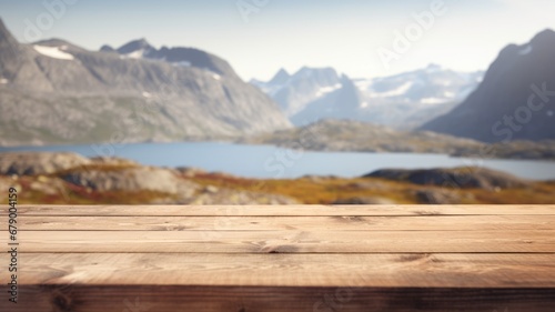The empty wooden brown table top with blur background of Greenland in summer. Exuberant image. generative AI © Summit Art Creations