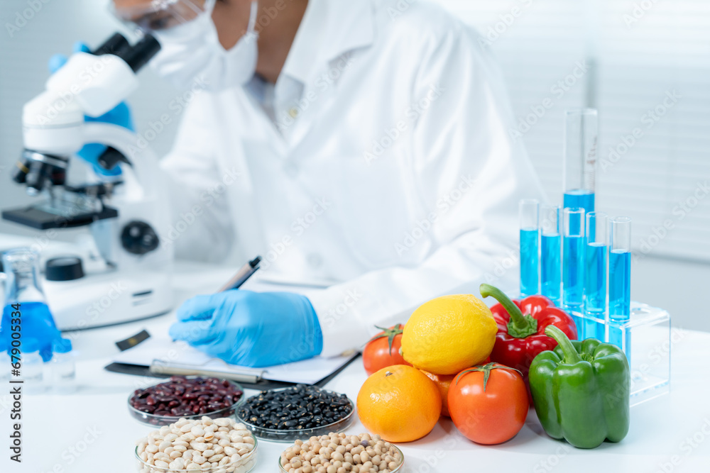 Scientist check chemical food residues in laboratory. Control experts inspect the concentration of chemical residues. hazards, ROHs standard, find prohibited substances, contaminate, Microbiologist Scientist check chemical food residues in laboratory. Control experts inspect the concentration of chemical residues. hazards, ROHs standard, find prohibited substances, contaminate, Microbiologist