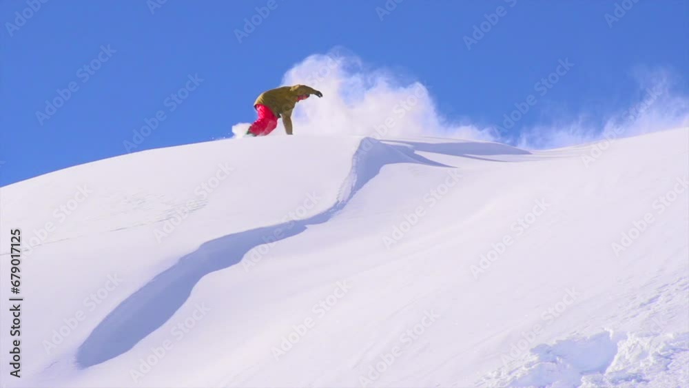 Cinematic Ikon Epic pass Colorado cold smoke below freezing snowboarder powder fresh snow turns butter slash air early frozen morning stunning beautiful blue sky super slow motion follow pan movement
