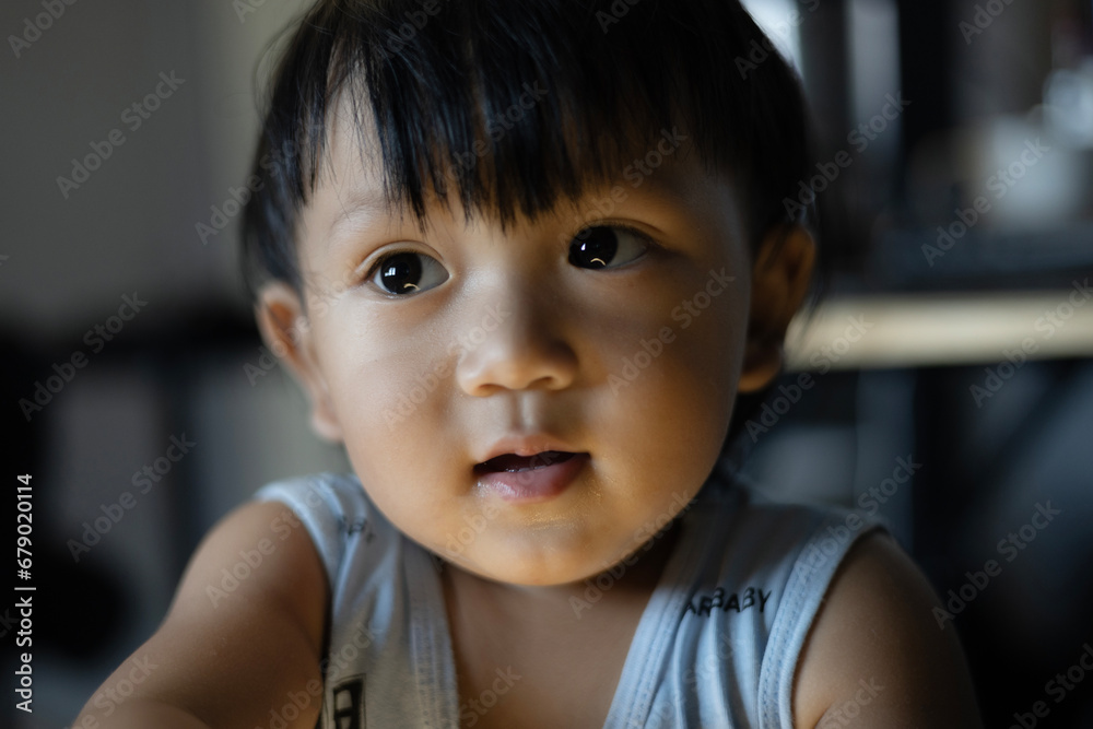 Little Boy Looking Up And Thinking. Close Up Portrait Of Child. Child With Thinking Casually. Little Boy Looking Up And Thinking. Close Up Portrait Of Child. Child With Thinking Casually.