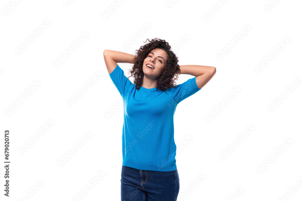 young happy woman with curly black hair dressed in a blue t-shirt young happy woman with curly black hair dressed in a blue t-shirt