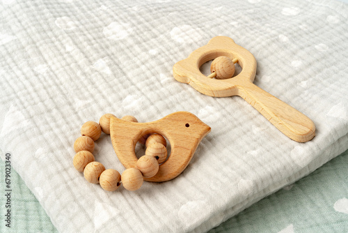 Baby muslin blanket and wooden toys for newborn