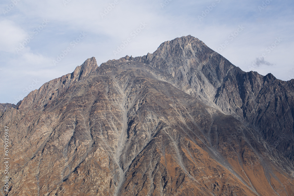 Amazing view of Mount Kazbeg in autumn. Mountain scene Amazing view of Mount Kazbeg in autumn. Mountain scene