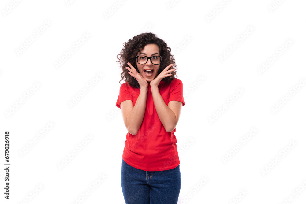 young emotional curly brunette promoter woman dressed in a red t-shirt with space for printing identities young emotional curly brunette promoter woman dressed in a red t-shirt with space for printing identities