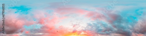 Sunset sky panorama with bright glowing pink Cumulus clouds. HDR 360 seamless spherical panorama. Full zenith or sky dome for 3D visualization, sky replacement for aerial drone panoramas. © svetograph