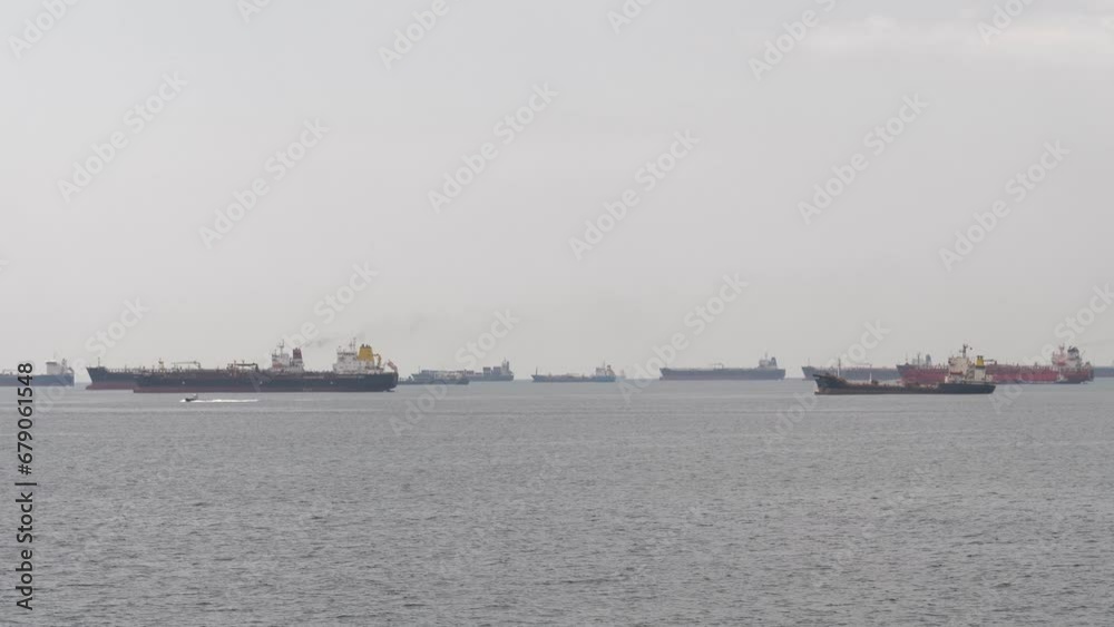 Marine panorama of the modern Bosphorus Strait. Dry cargo ships on the roads in the waters of the port of Istanbul Marine panorama of the modern Bosphorus Strait. Dry cargo ships on the roads in the waters of the port of Istanbul