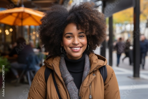 Close up portrait happy wide toothy smiling African American young ethnic woman girl female student tourist traveler successful businesswoman city street cafe outside holidays weekend travelling tour photo