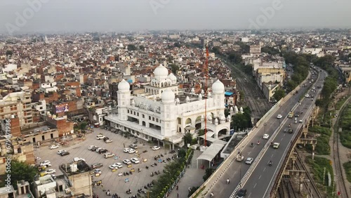 Aerial view of a Gurudwara (Sikh Temple) situated amidst Ludhiana city of Punjab, India. Drone shot of a Gurudwara situated alongside the Jammu-Kanyakumari national highway (Grand Trunk Road)
