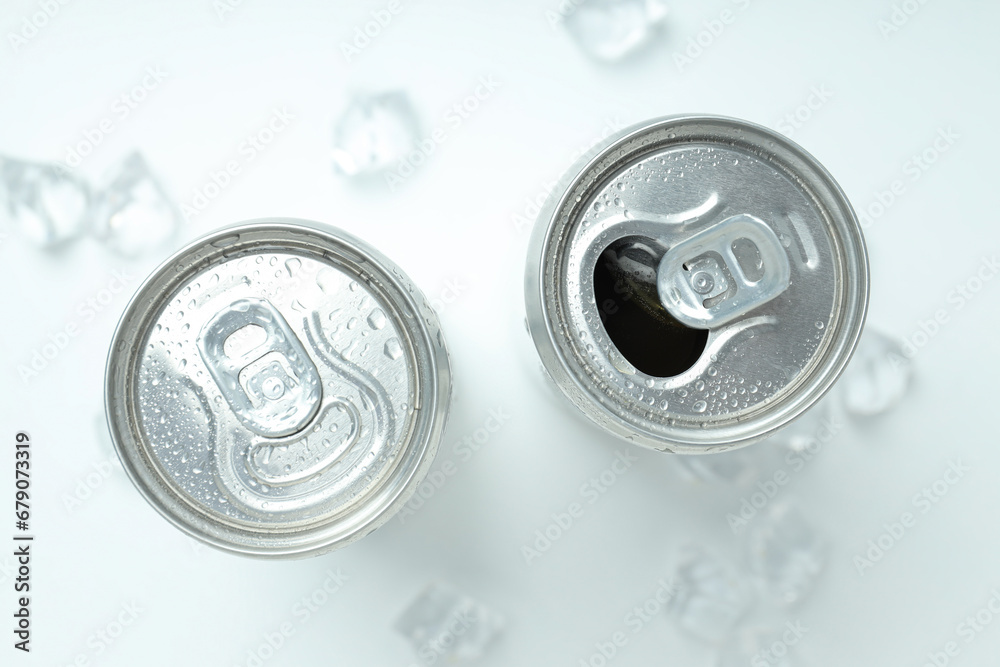 Tin cans for drinks with ice cubes Tin cans for drinks with ice cubes
