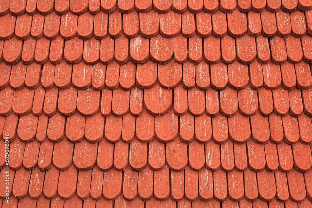 Red painted wood roof shingles in horizontal orientation. Red painted wood roof shingles in horizontal orientation.