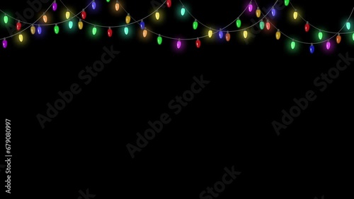 Christmas colorful lights garlands on black background. Looped animation of glowing light bulbs. 4k
