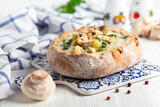 Potato-mushroom soup in a loaf of bread.