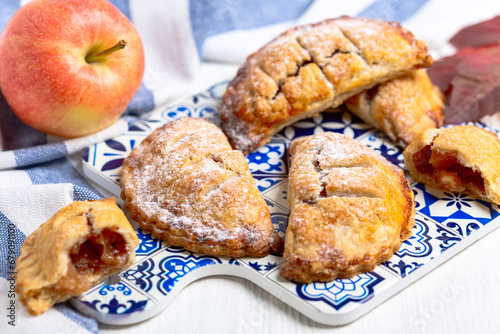 Small homemade pies with apple filling.