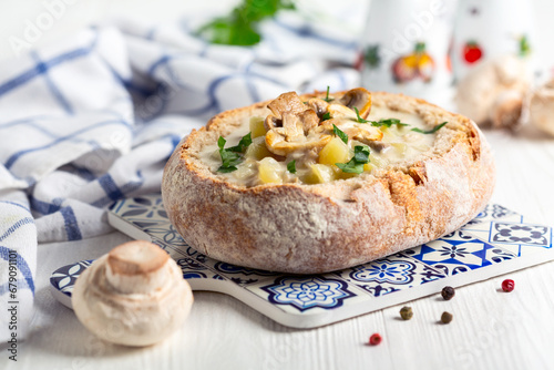 Potato-mushroom soup in a loaf of bread.