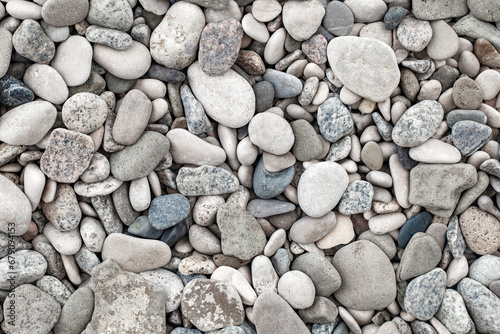 Pebbles, large oval beach sea stones, close-up, top view