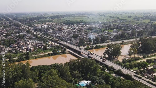 Aerial view of Ludhiana city of Punjab, India. Drone shot of Jammu-Kanyakumari National Highway (Grand Trunk Road)